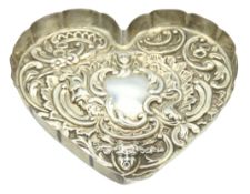 A Victorian 1899 London silver repoussé work heart
