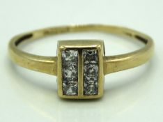 A 9ct gold ring set with paste stones, 1.5g, size