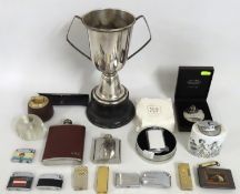 A silver plated trophy with stand, no inscription,