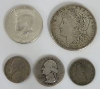 Four US 0.900 silver coins including a 1964 Kenned