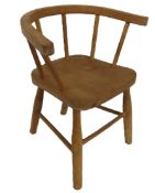 A child's elm arm chair, 500mm high to back