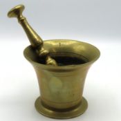 A mid 19thC. bronze mortar & pestle, mortar 107mm