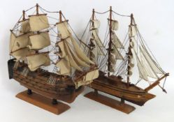 Two model ships, one being Nelson's HMS Victory, 4