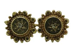 A pair of 9ct gold earrings set with small diamond