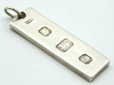 A 1979 London silver ingot, 49mm drop, 15.8g