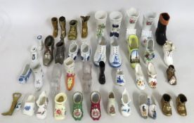 A quantity of various collectable shoe ornaments i