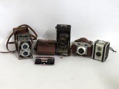 A Halina A1 twin lens camera twinned with a Kodak