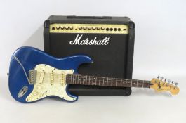 A Japanese Fender Stratocaster guitar twinned with