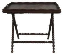 A Victorian oak butler's tray with folding stand,