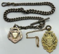 A silver Albert chain with two Edwardian silver fo