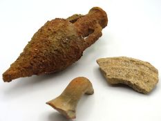 An ancient amphora, possibly Greek or Roman, with