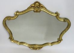 A decorative mirror of baroque styling, 905mm wide