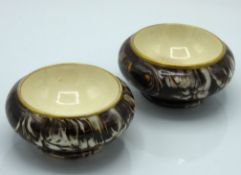 A pair of 19thC. Macintyre mocha agate ware potter