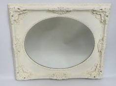 A decorative off white framed mirror, 915mm x 765m