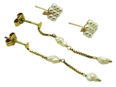 A pair of drop earrings set with rice pearl, 39mm