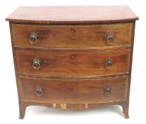 A 19thC. bow fronted chest of drawers, some losses
