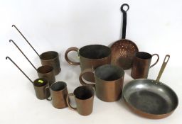 A selection of various kitchen copper wares includ