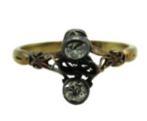 An 18ct gold ring, damaged, set with two remaining