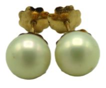 A pair of yellow metal mounted cultured pearl scre