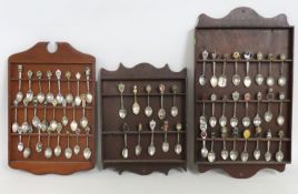 Three racks of approx. 58 plated & metal tourist s