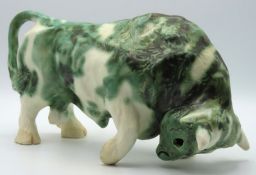 A retro Paula Humphries bull figure, repair to one