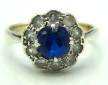 A 9ct gold & silver ring set with paste stones, bl