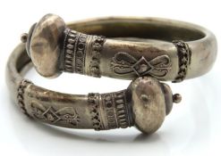 An antique Etruscan style white metal bangle, 58mm