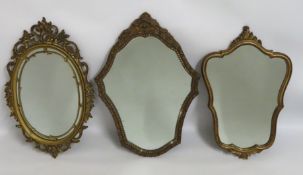 Three decorative mirrors, tallest 750mm