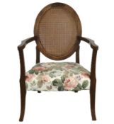 A Bergere style armchair, 850mm high to back
