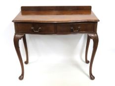 A Queen Anne style mahogany console table with cab