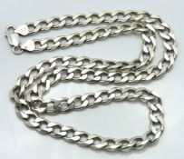 A substantial silver curb link chain, 568mm long,