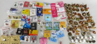 A collection of Scottish animal figures twinned with a collection of pin badges & thimbles