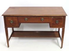 An Edwardian mahogany desk, 1220mm wide x 590mm de