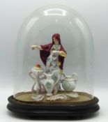 After Meissen, a late 19thC. Volkstadt porcelain group 