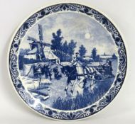 A large 20thC. Delft charger, 397mm diameter