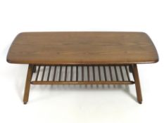 An Ercol model 459 elm coffee table, 1050mm wide x