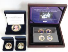 Four cased coin sets related to the Royal Family w