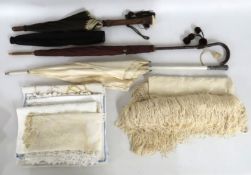 Two vintage umbrellas twinned with one vintage par