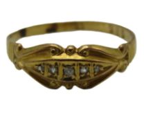 An 18ct gold ring set with small diamonds, 2.1g, s
