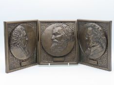 Three bronze resin plaques depicting composers Bac