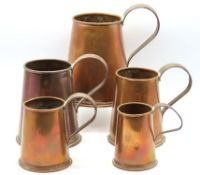 A set of five copper graduated tankards, largest 1