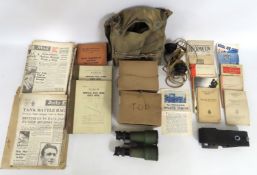 Two boxed WW2 gas masks, one other WW2 respirator,