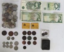 Four QEII £1 bank notes, an 1858 Victoria penny, a