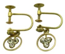 A pair of 9ct gold screw back earrings set with pa