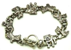 A silver dog charm bracelet, 195mm long, 22.8g