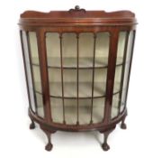 An Edwardian demi-lune glazed display cabinet with