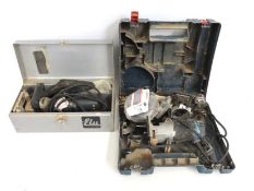 A cased Elu belt sander twinned with a Bosch GFK60