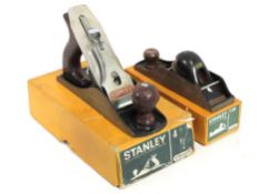 A boxed Stanley no. 4 plane twinned with a boxed S