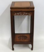 A Chinese rosewood pot stand, 805mm high x 377mm w