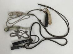 Two naval issue Bosuns whistles with broad arrow m